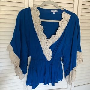 Blue mid sleeve top with crochet detailing